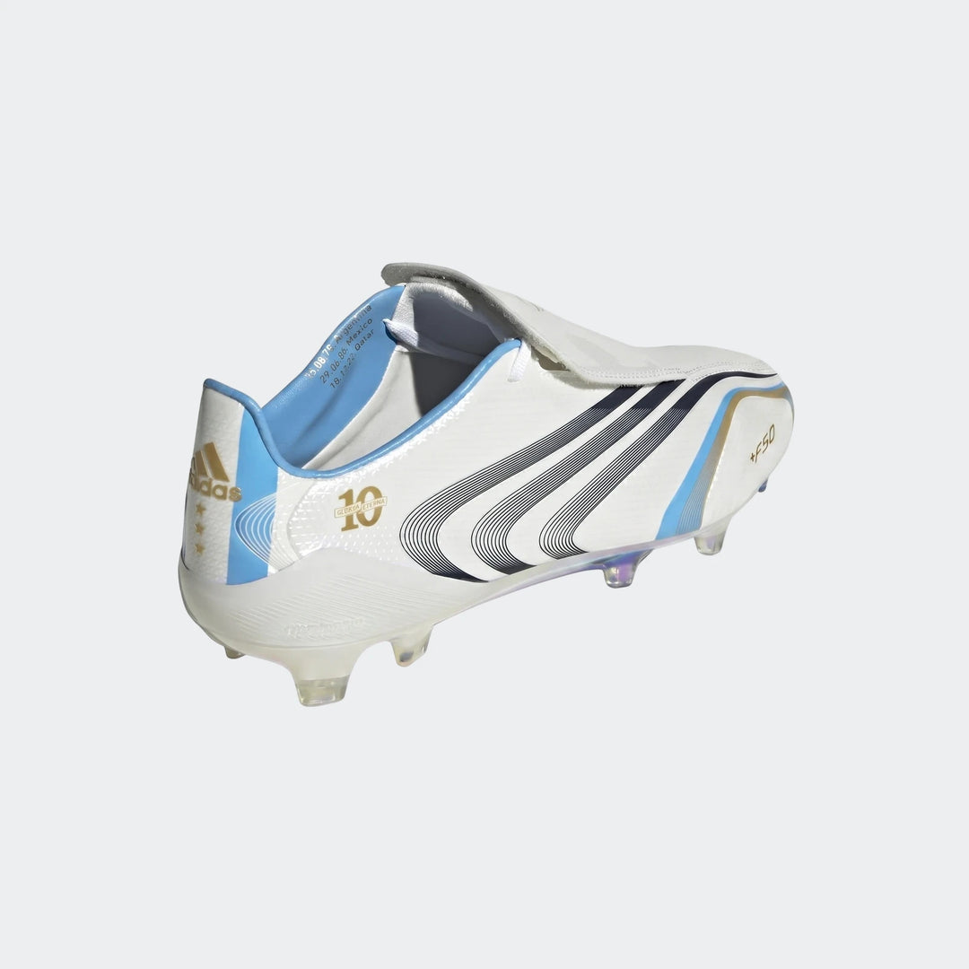 Adidas F50 Tunit Firm Ground Football Boots in white, light blue, and gold, viewed from the side, showing the studs.