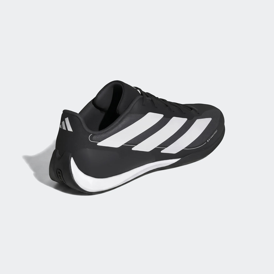 Adidas Feroza Base Shoes in black and white, featuring a sporty design with three stripes, presented in a rear-quarter view.