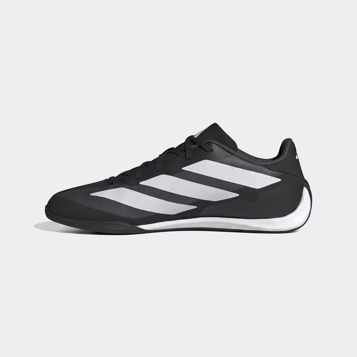 Black and white Adidas Feroza Base shoes with three white stripes on the side, shown in a clean side profile view.