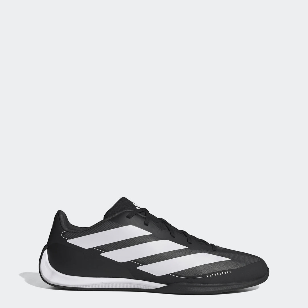 Adidas Feroza Base Shoes in black and white, featuring three stripes and 'MOTORSPORT' branding, viewed from the side.