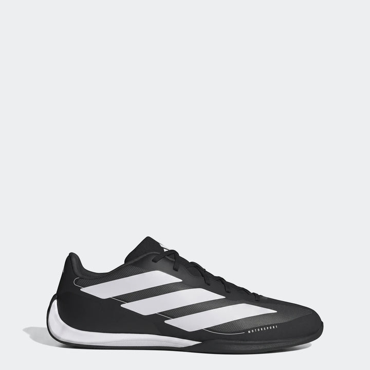 Adidas Feroza Base Shoes in black and white, featuring three stripes and 'MOTORSPORT' branding, viewed from the side.