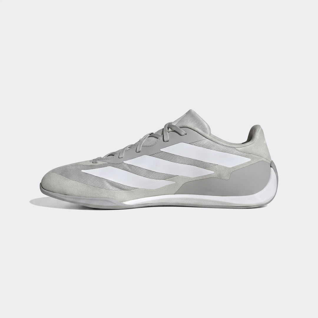 Grey Adidas Feroza Base Shoes with white stripes, shown in a side profile view, suitable for athletic activities.