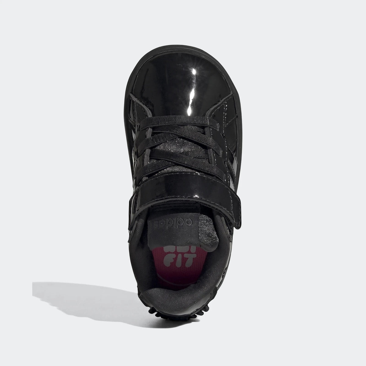 Top-down view of a single black Adidas Grand Court 3.0 Infant Girl's Shoe, featuring a glossy patent finish, black laces,