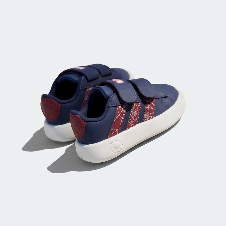 Pair of kids' Adidas Grand Court Spider-Man Cloudfoam shoes in navy blue, red, and white with velcro straps, viewed from an