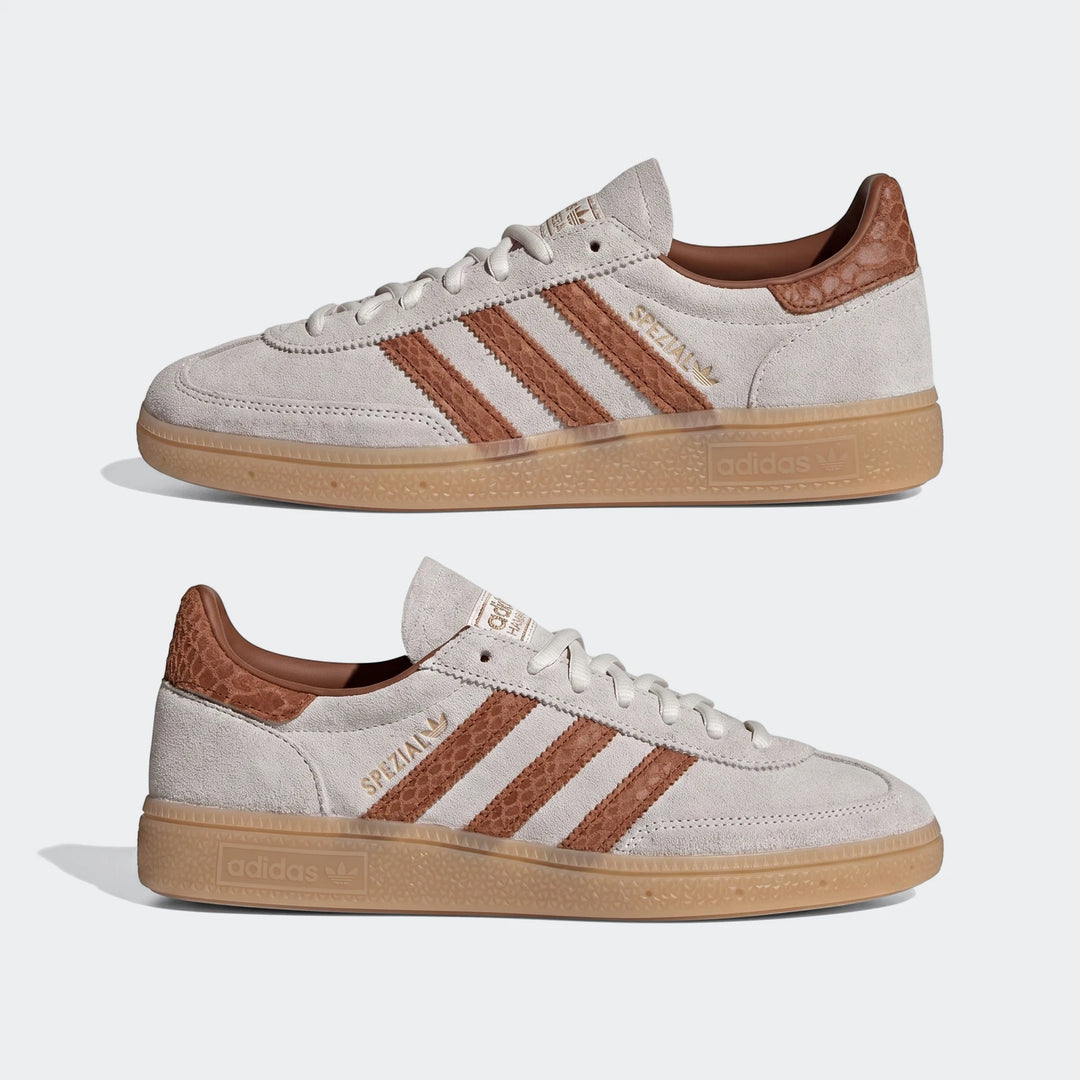 Two pairs of Adidas Handball Spezial Shoes in light gray suede with brown stripes and gum soles, shown in a side-by-side