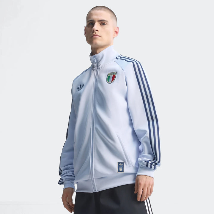 Light blue Adidas Italy Originals Track Top on a male model, showcasing the iconic trefoil logo and Italian crest.