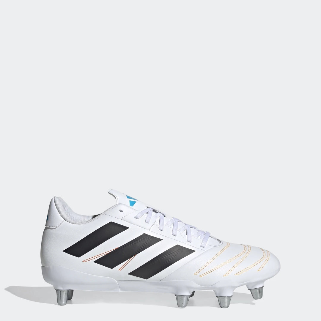 White Adidas Kakari Elite SG rugby boots featuring black stripes and silver studs, shown from a side view.