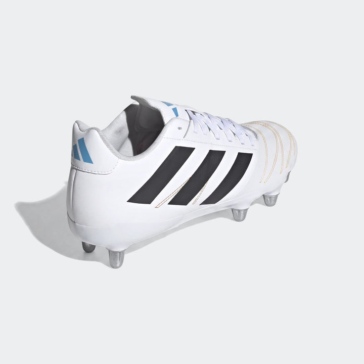 White Adidas Kakari Elite SG rugby boots with black stripes and light blue logo, shown from a rear-right quarter view.