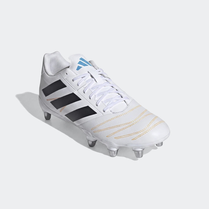 White Adidas Kakari Elite SG Rugby Boots with black stripes and light blue logo, shown from a side perspective.