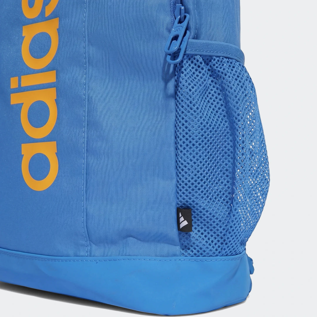 Close-up of a blue Adidas Kids Lin Bk Pk backpack featuring a side mesh pocket, zipper, and brand logo detail.