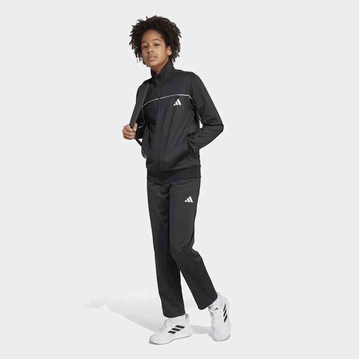 Black Adidas Kids Tricot Colour Pop Track Suit worn by a young person, shown in a full-body view.