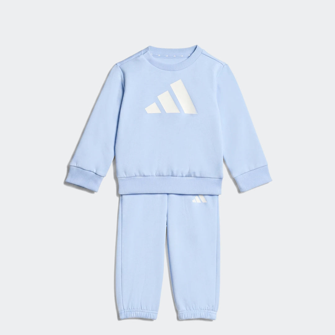 Light blue Adidas Essentials Jogger Set for toddlers, featuring a long-sleeve sweatshirt with a white logo and matching