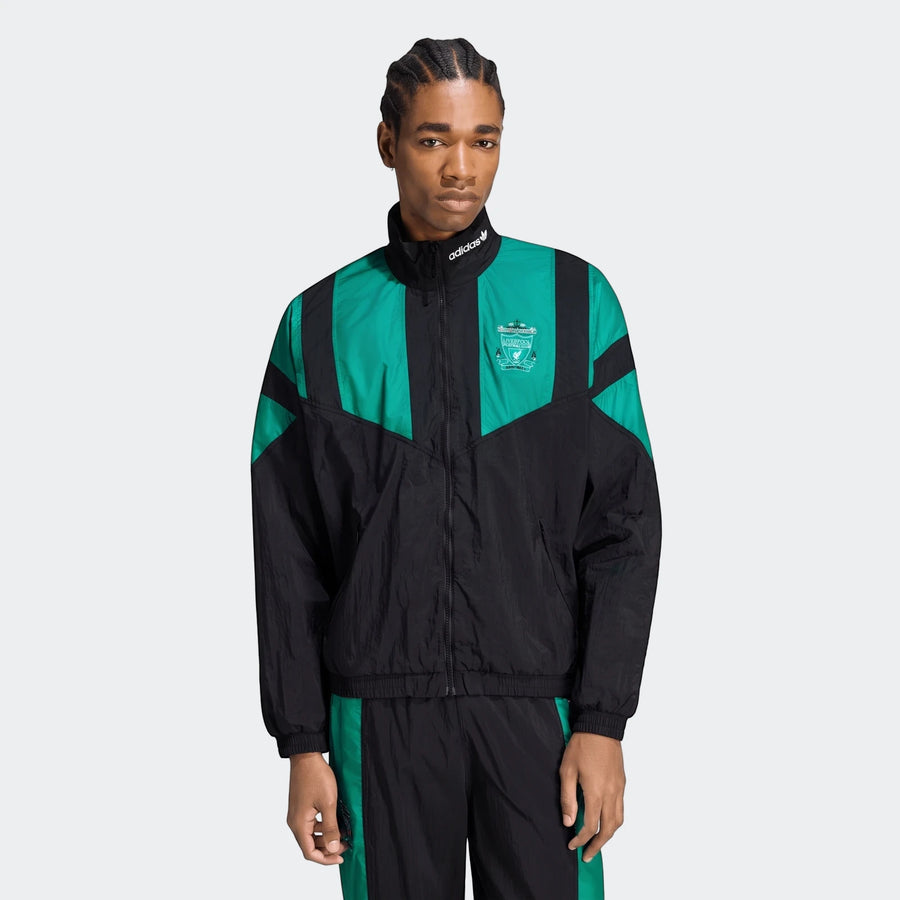 Male model wearing a black and green Adidas Liverpool FC EQT Track Top, featuring a full-zip front and stand-up collar.