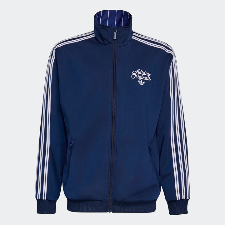 Navy blue Adidas Originals Firebird Loose Reversible Tracktop with white three stripes, full-zip, and ribbed collar.