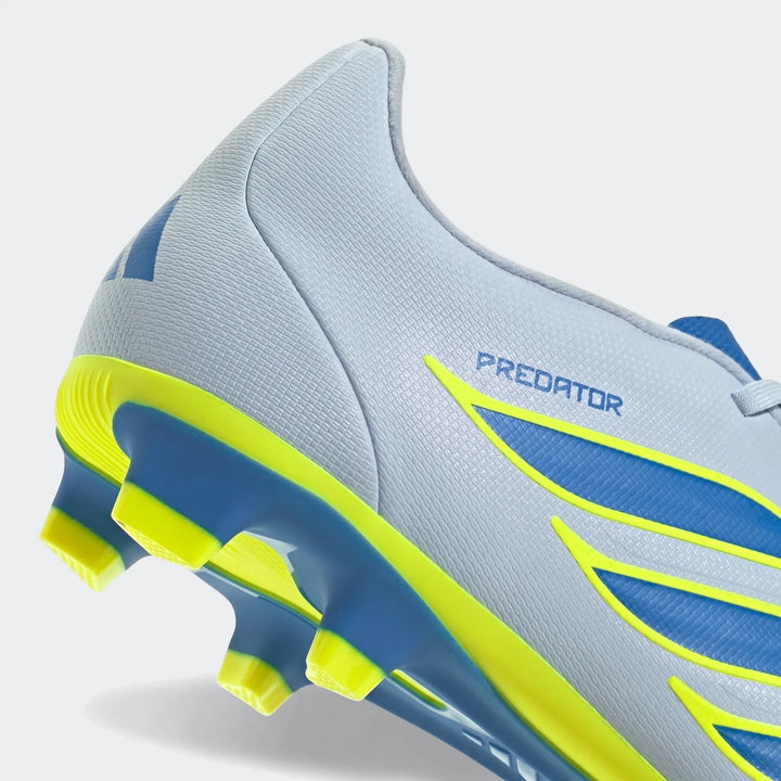 Close-up angled view of a light gray Adidas Predator Club firm ground football boot with blue and neon yellow accents.