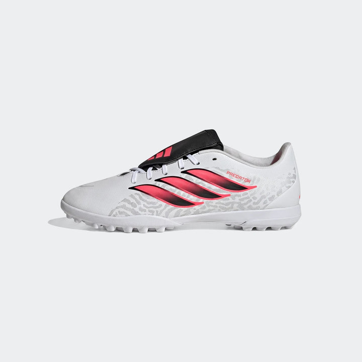 White Adidas Predator Club Fold-Over Tongue Turf Football Boots, featuring bold pink stripes and a textured upper, shown