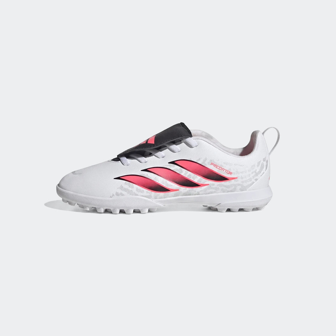 Adidas Predator Club Kids' Turf Football Boots in white and pink, side view, with fold-over tongue and elastic laces.