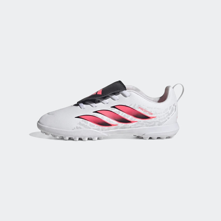Adidas Predator Club Kids' Turf Football Boots in white and pink, side view, with fold-over tongue and elastic laces.