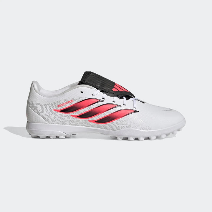 White Adidas Predator Club Fold-Over Tongue turf football boots with pink and black stripes, shown in a side view.