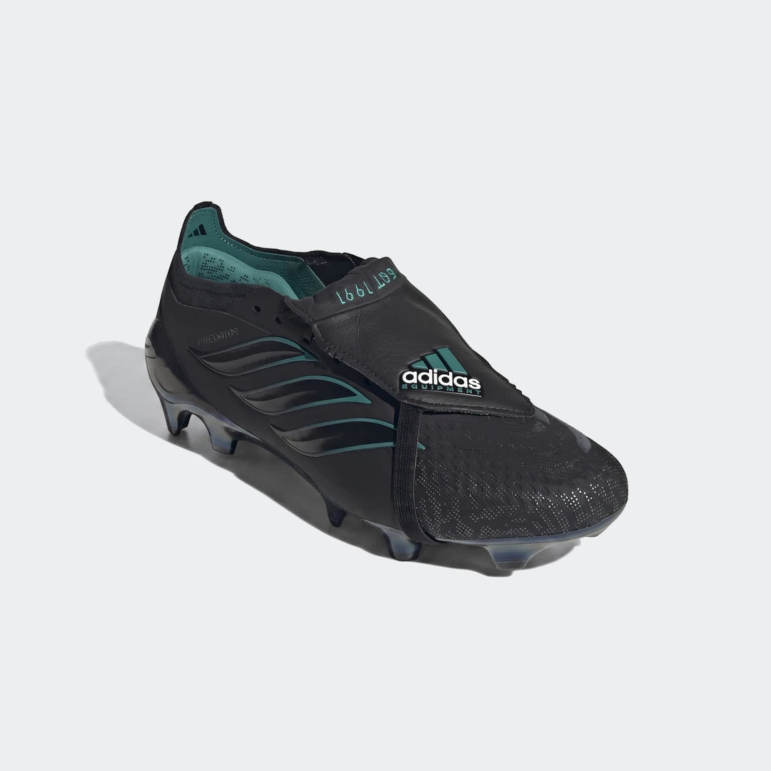 Black Adidas Predator Elite Ft Fg Eqt football boots with teal accents and textured upper, displayed angled on a plain