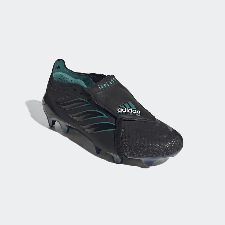 Black Adidas Predator Elite Ft Fg Eqt football boots with teal accents and textured upper, displayed angled on a plain