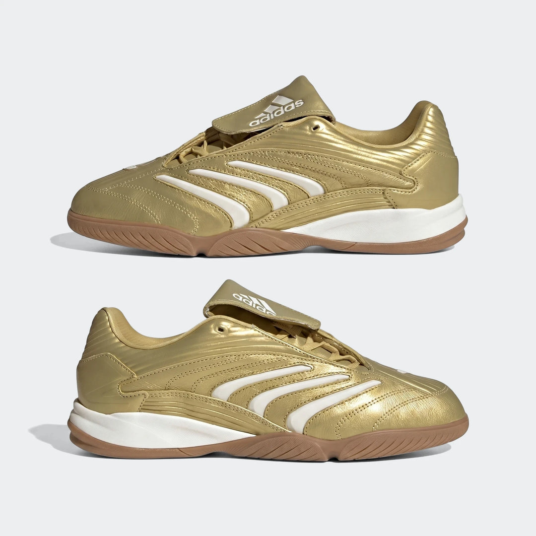 Two gold and white Adidas Predator Sala Indoor Football Boots with brown gum soles, shown from a side profile view.
