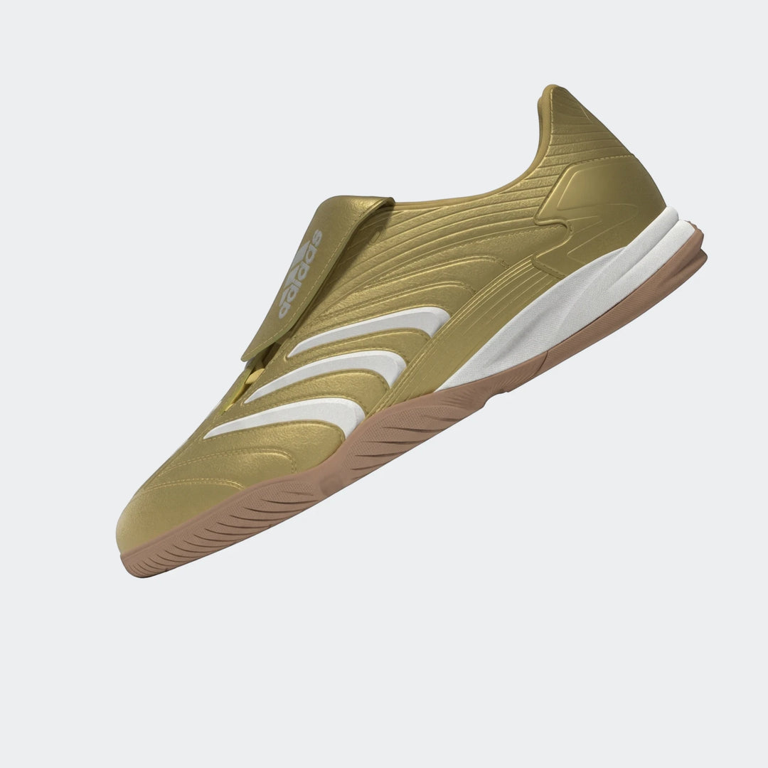 Gold adidas Predator Sala Indoor Football Boots with white stripes and a brown gum sole, viewed from a three-quarter angle.