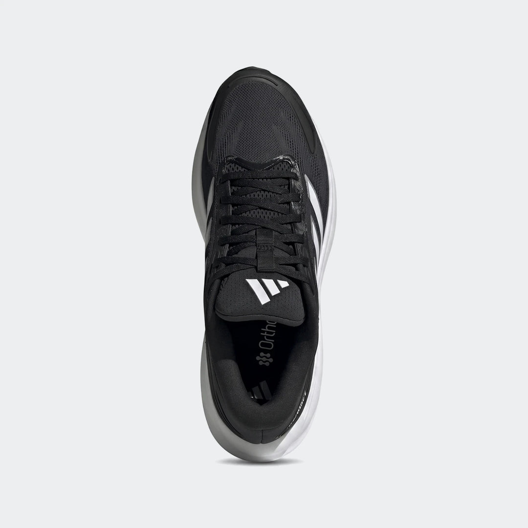 Top-down view of a black Adidas Response 2 running shoe featuring white soles and prominent branding.