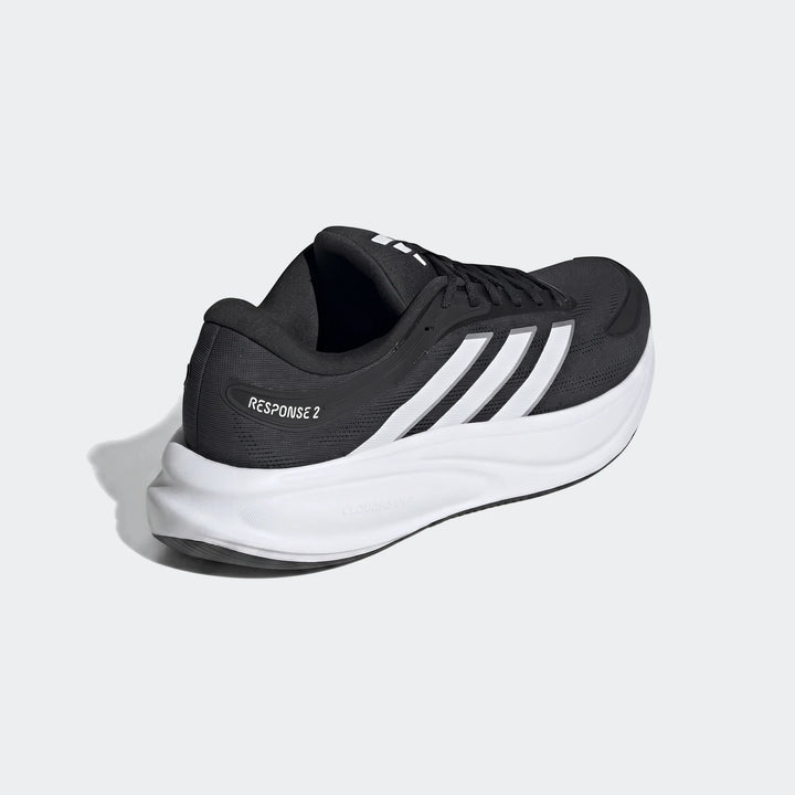 Adidas Response 2 Running Shoes in black and white, featuring white stripes and a thick white sole, viewed from the