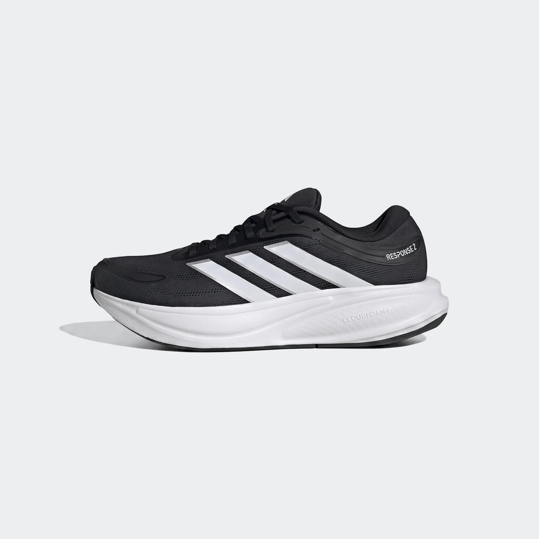 Adidas Response 2 Running Shoes in black and white, featuring Cloudfoam cushioning, shown in a side view.