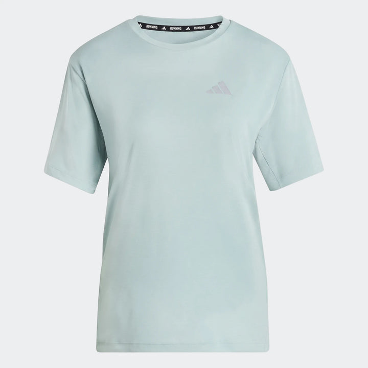 Light blue Adidas Run Essentials T-Shirt with short sleeves, featuring a subtle logo, presented on a gray background.