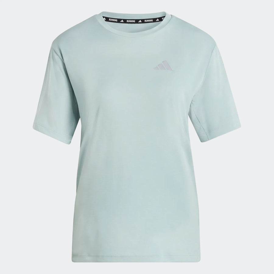 Light blue Adidas Run Essentials T-Shirt with short sleeves, featuring a subtle logo, presented on a gray background.