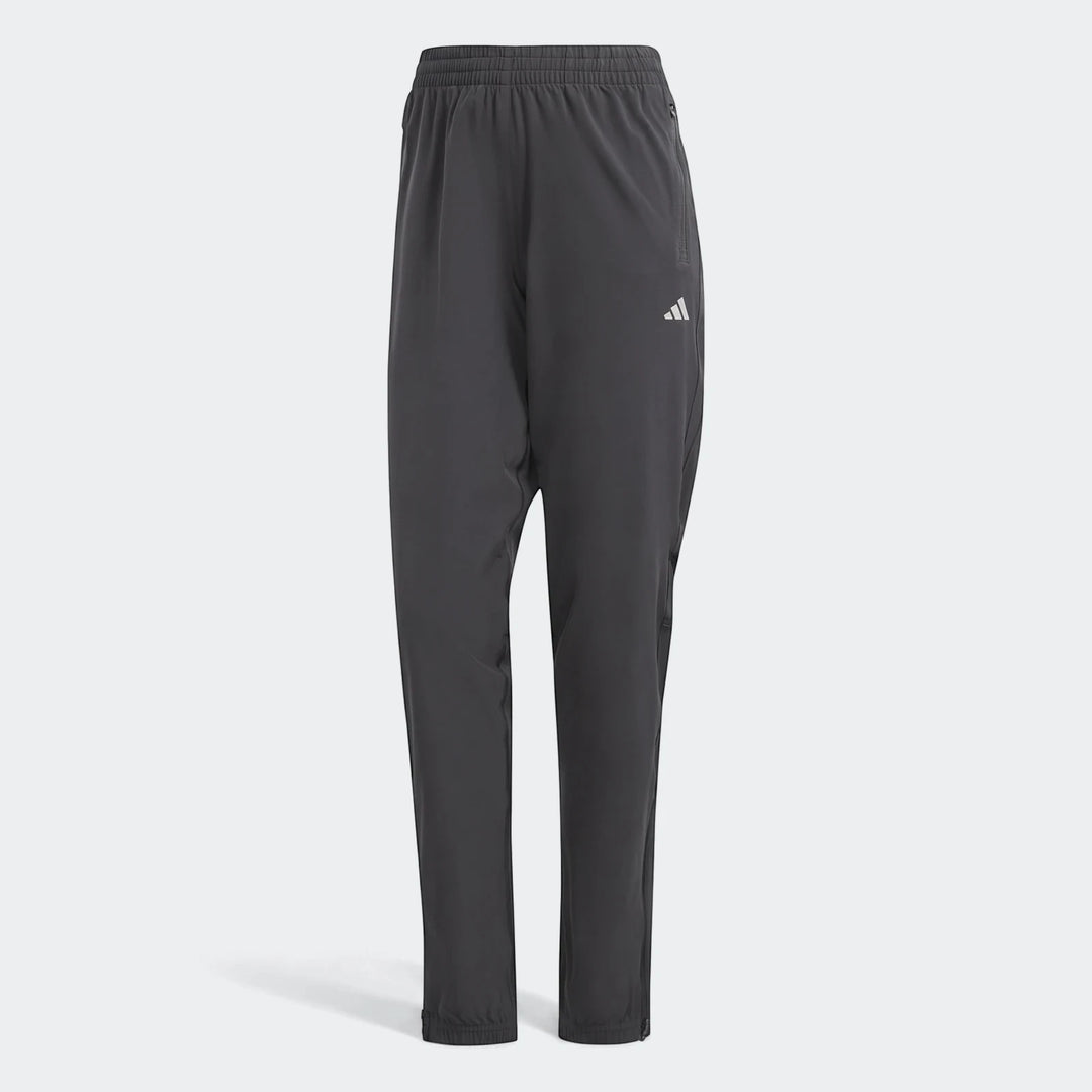 Dark gray Adidas Run It Tko Joggers for men, featuring a comfortable loose fit, tapered legs, zippered pockets, and