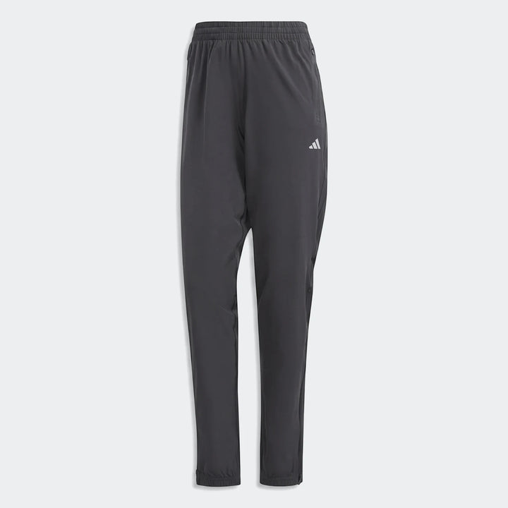 Dark gray Adidas Run It Tko Joggers, full length, with an elastic waistband and white logo on the thigh, presented on a