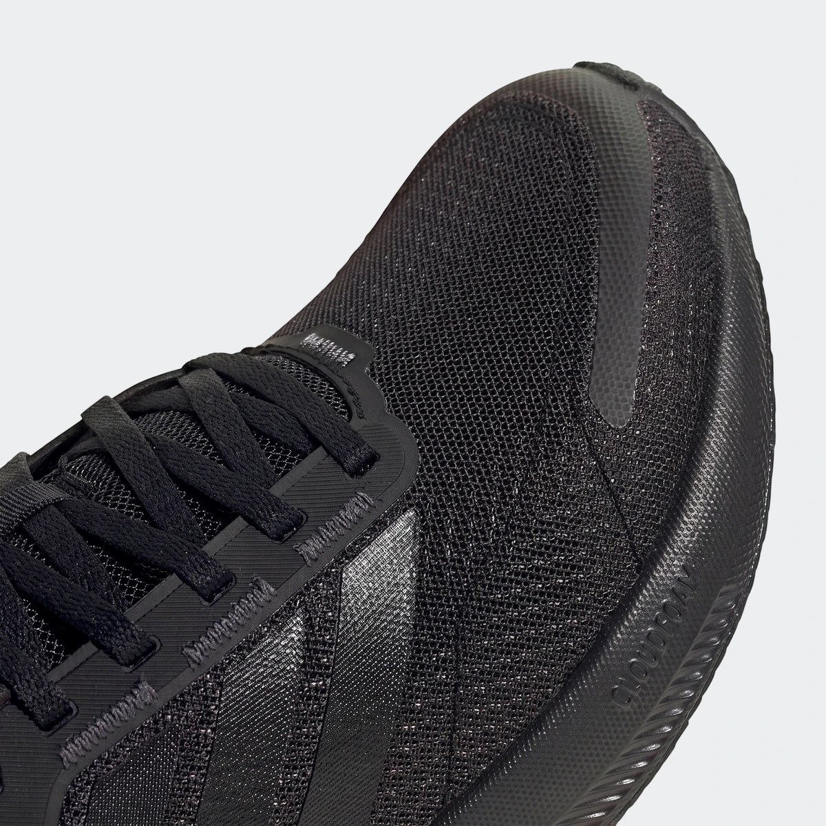 Close-up front view of a black adidas Runblaze W Running Shoe, highlighting the breathable mesh upper and durable sole.