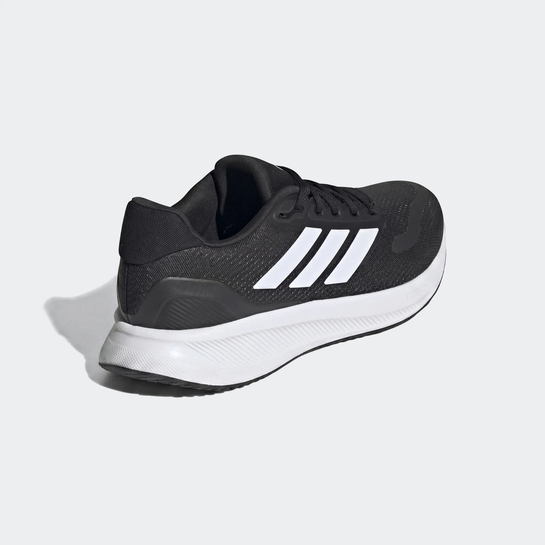Black Adidas Runfalcon 5 running sneakers with white three stripes and a white sole, viewed from a 3/4 rear-side angle on a
