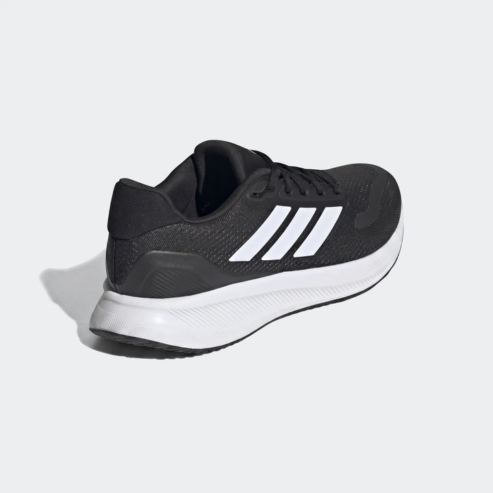 Black Adidas Runfalcon 5 running sneakers with white three stripes and a white sole, viewed from a 3/4 rear-side angle on a