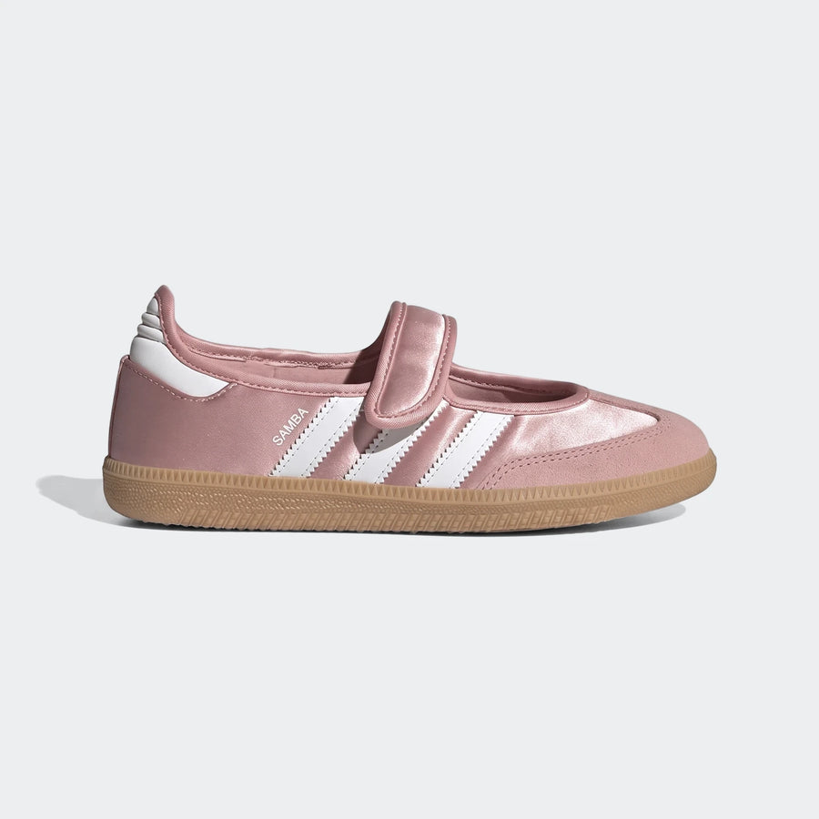 Pink satin Adidas Samba Jane shoes with white stripes and a velcro strap, showcasing a classic sneaker-mary jane hybrid