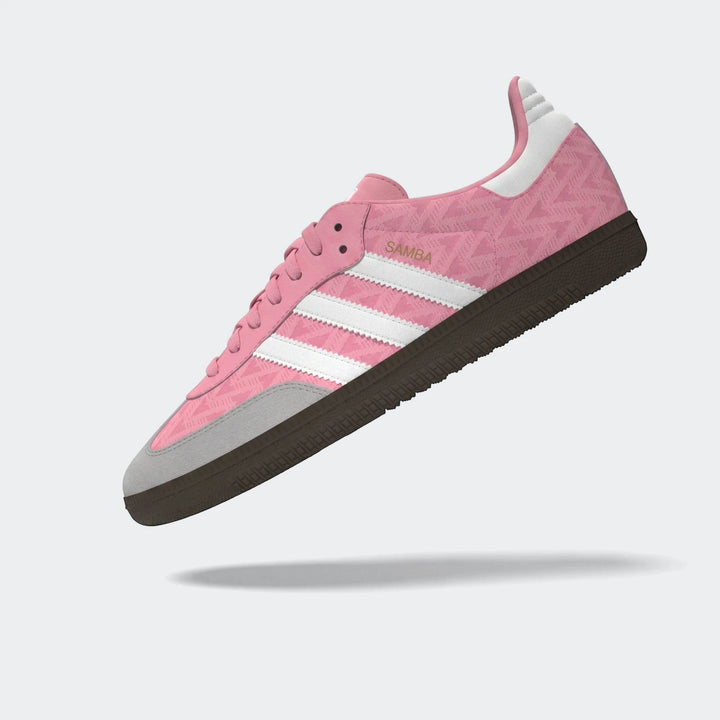 Pink Adidas Samba OG Kids shoes with white stripes and gray suede toe, seen from a side profile view.