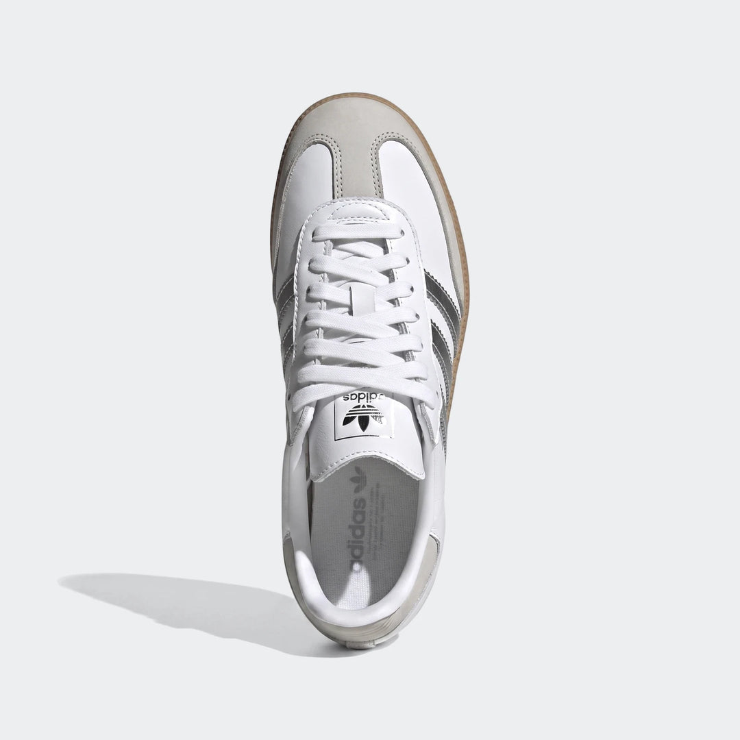 White Adidas Samba OG leather shoes with grey suede details, shown from a top-down view.