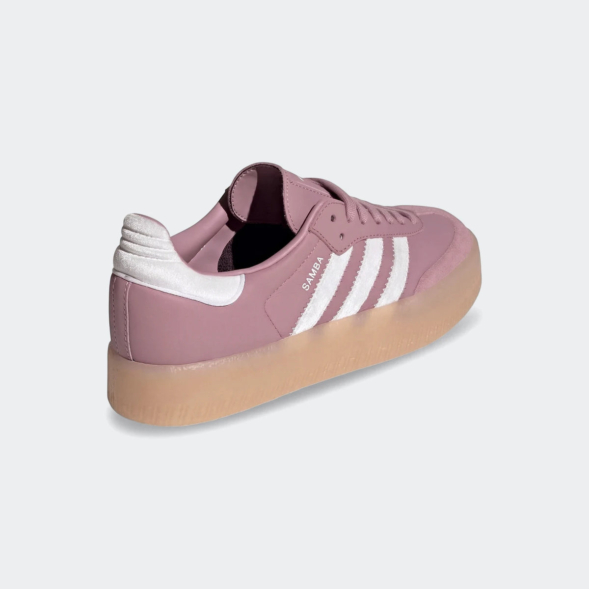 Adidas Sambae Shoes in dusty pink with white stripes, a white ribbed heel tab, and a translucent gum sole, viewed from the