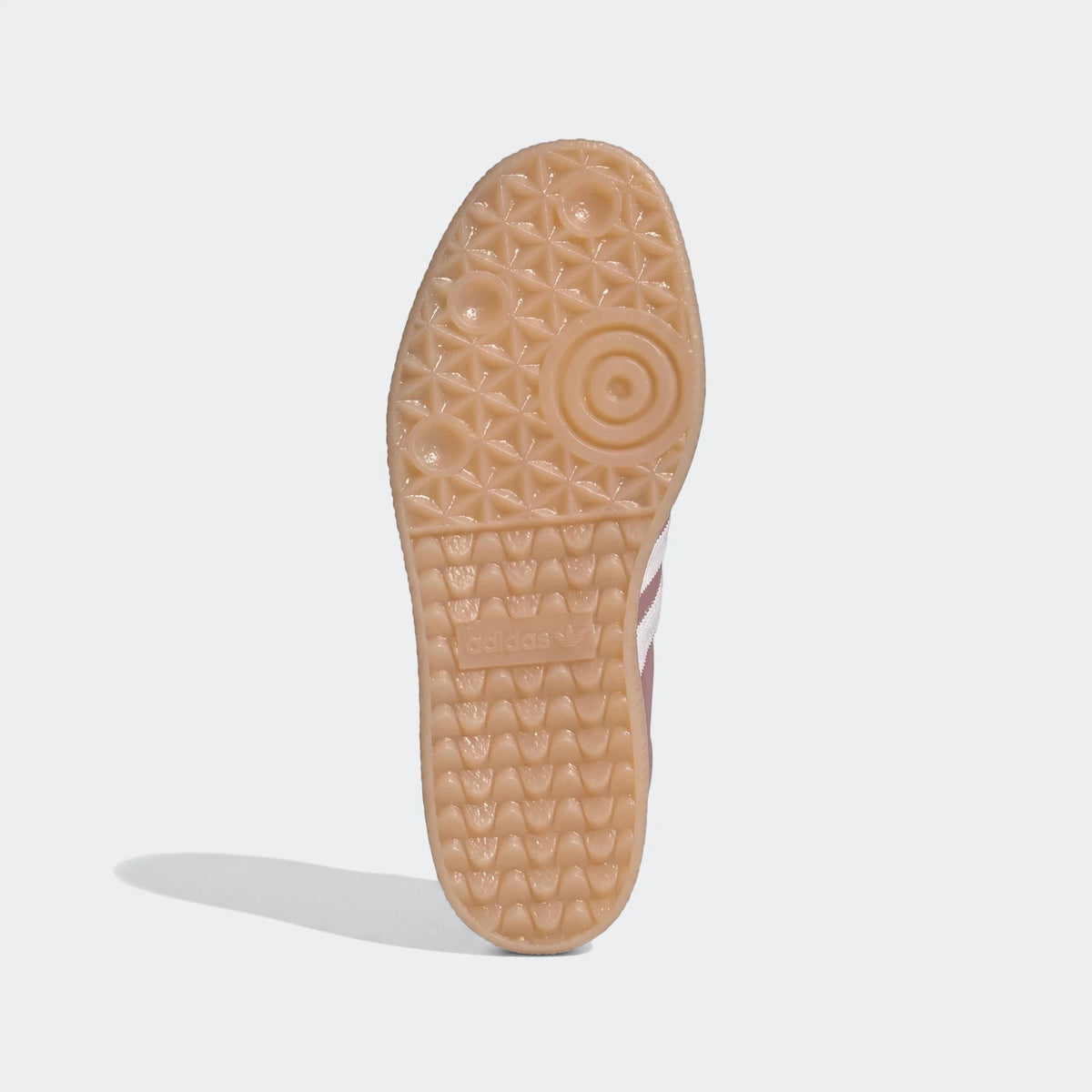 Adidas Sambae Shoes with a textured gum sole featuring a distinct geometric tread pattern and white stripes, viewed from the