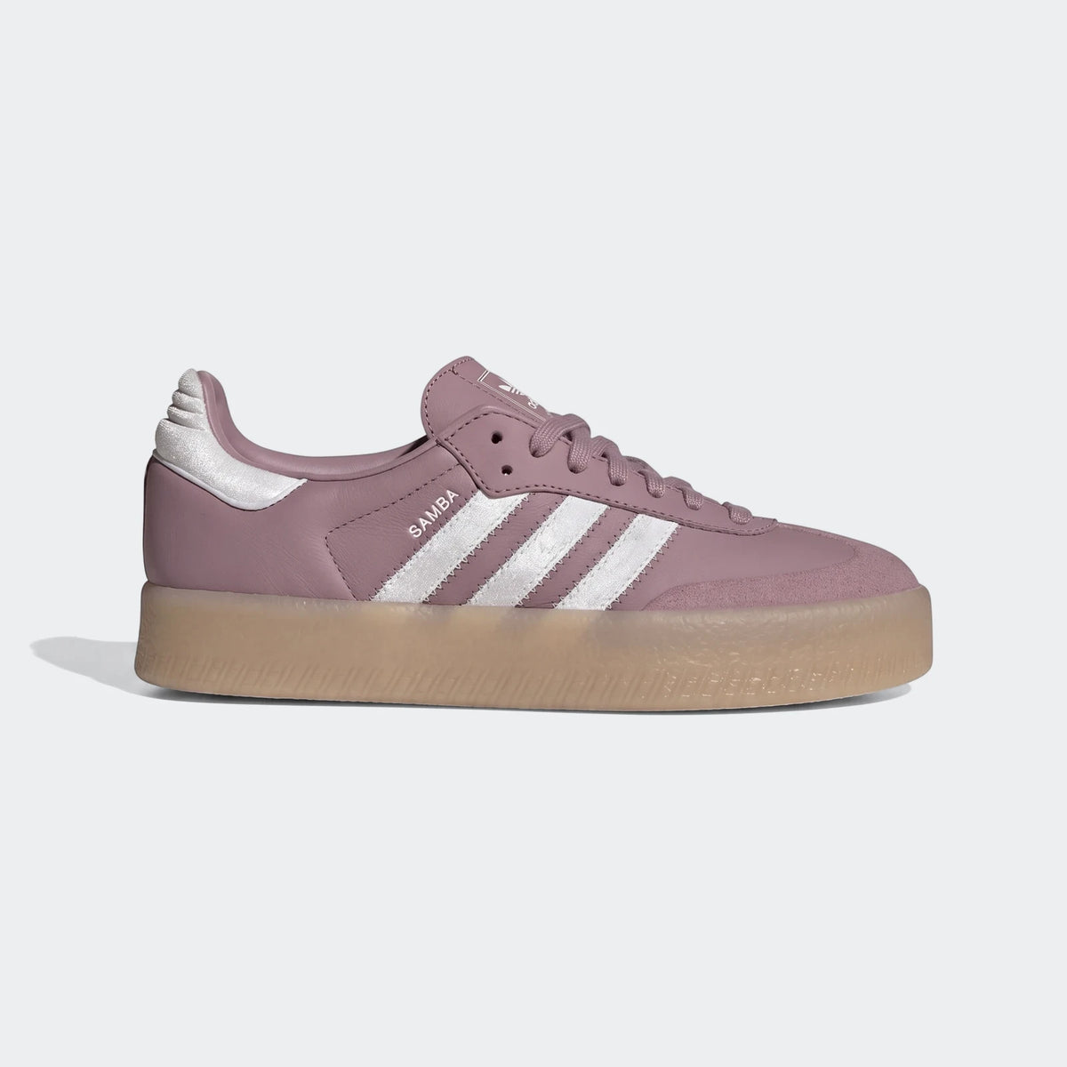 Adidas Sambae shoes in mauve pink with white stripes and a platform gum sole, viewed from the side.