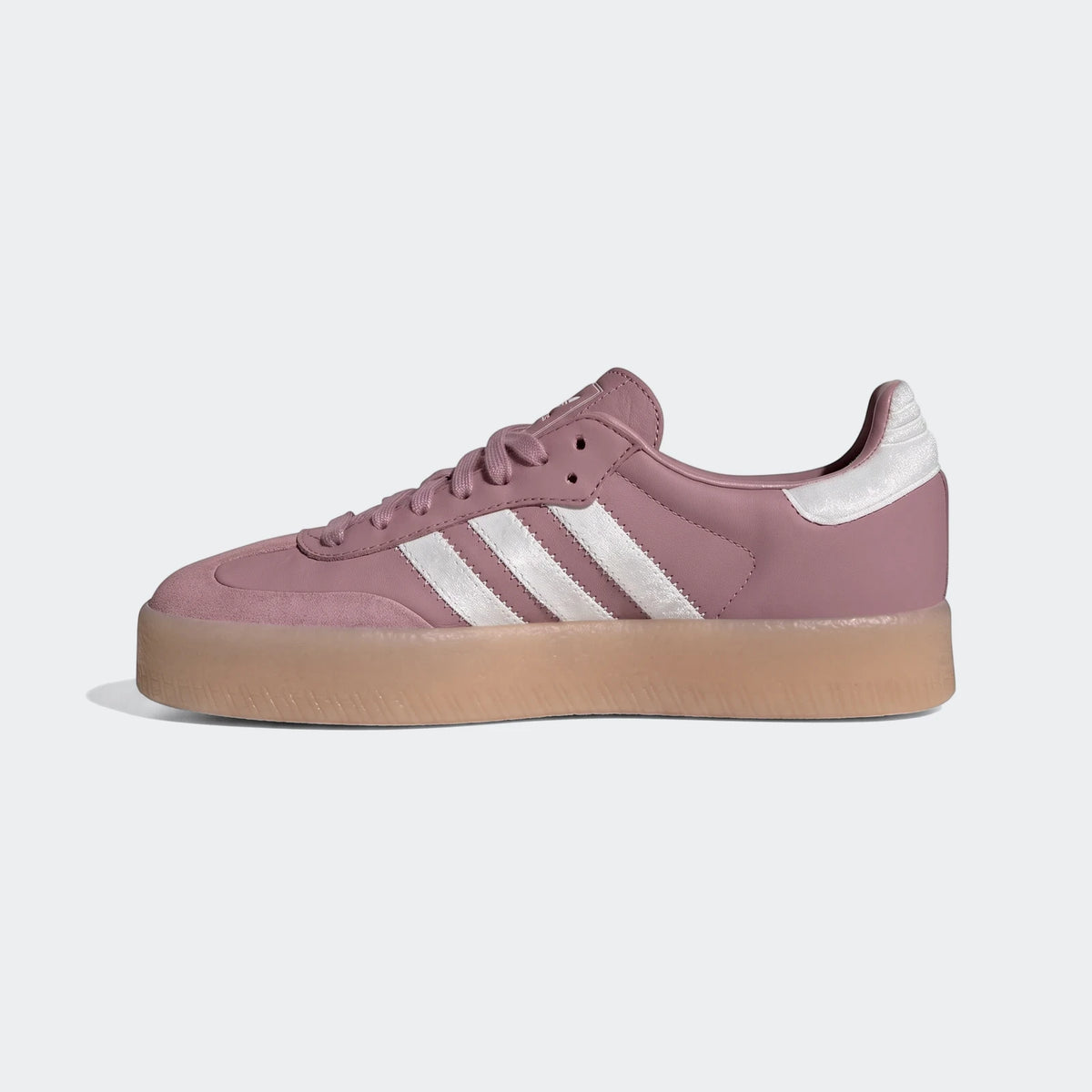 Pink Adidas Sambae Shoes with a platform sole and white stripes, showcased in a side profile view.