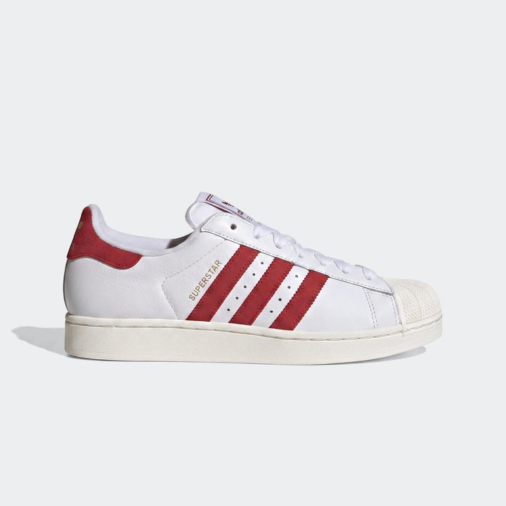 Men's Adidas Superstar II shoes in white with red stripes, featuring a classic shell toe design, side view.