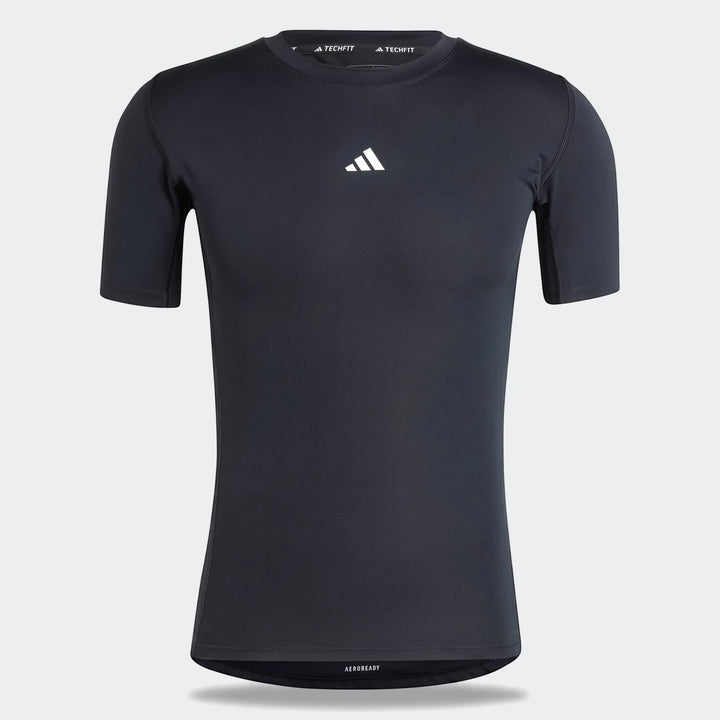 Dark grey Adidas Techfit Aeroready short-sleeved compression football t-shirt for men, shown on a mannequin.