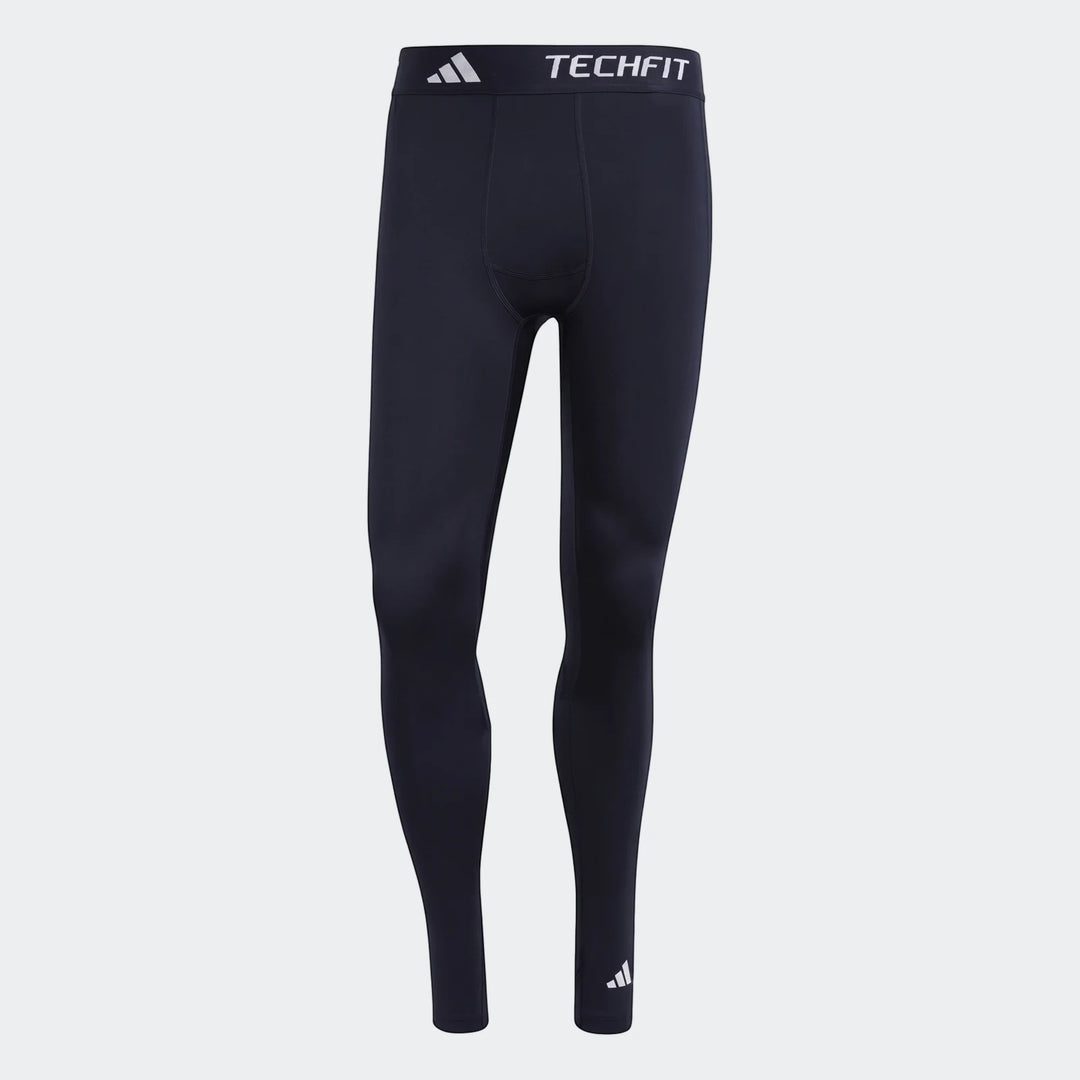 Dark blue adidas Techfit football base layer tights, featuring Techfit branding on the waistband.