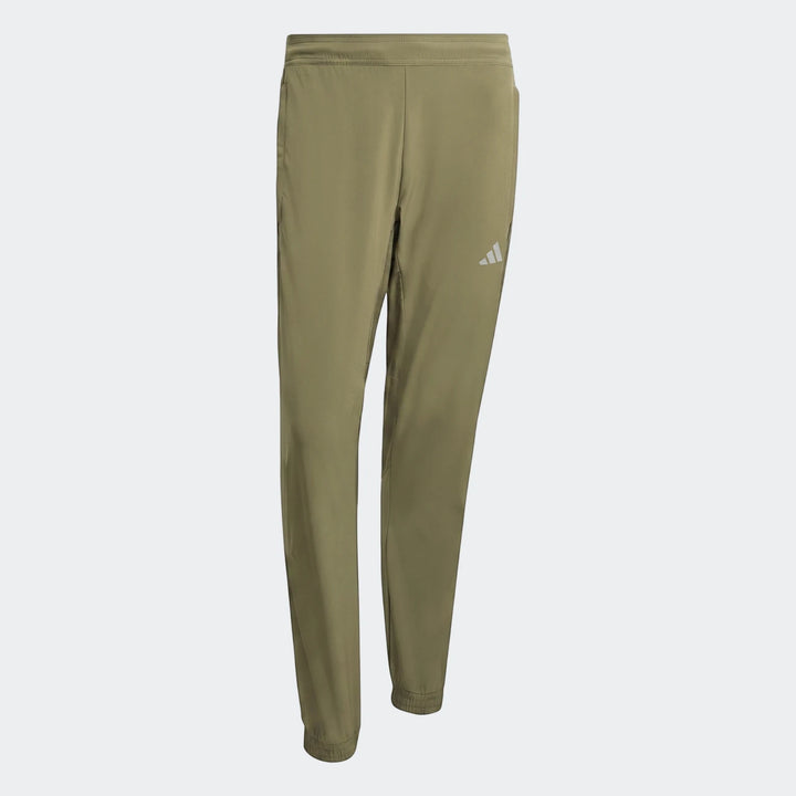 Olive green Adidas Technical Apparel Slim Pants, laid flat, featuring a reflective logo.