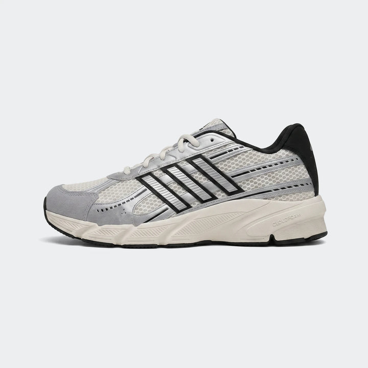 Adidas Technochaos 2000 Shoes in grey, white, and black, featuring mesh and synthetic overlays, displayed at an angle.