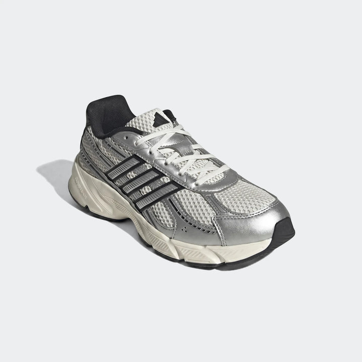 Adidas Technochaos 2000 Shoes in silver and white, featuring black accents and a chunky sole, shown from an angled view.